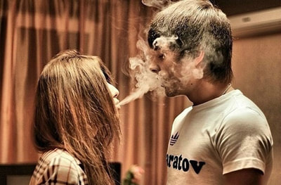 couple smoking together